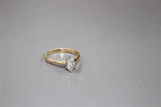 A 20th century Italian 18k yellow metal and marquise set solitaire diamond ring, size K, gross weight 1.8 grams.